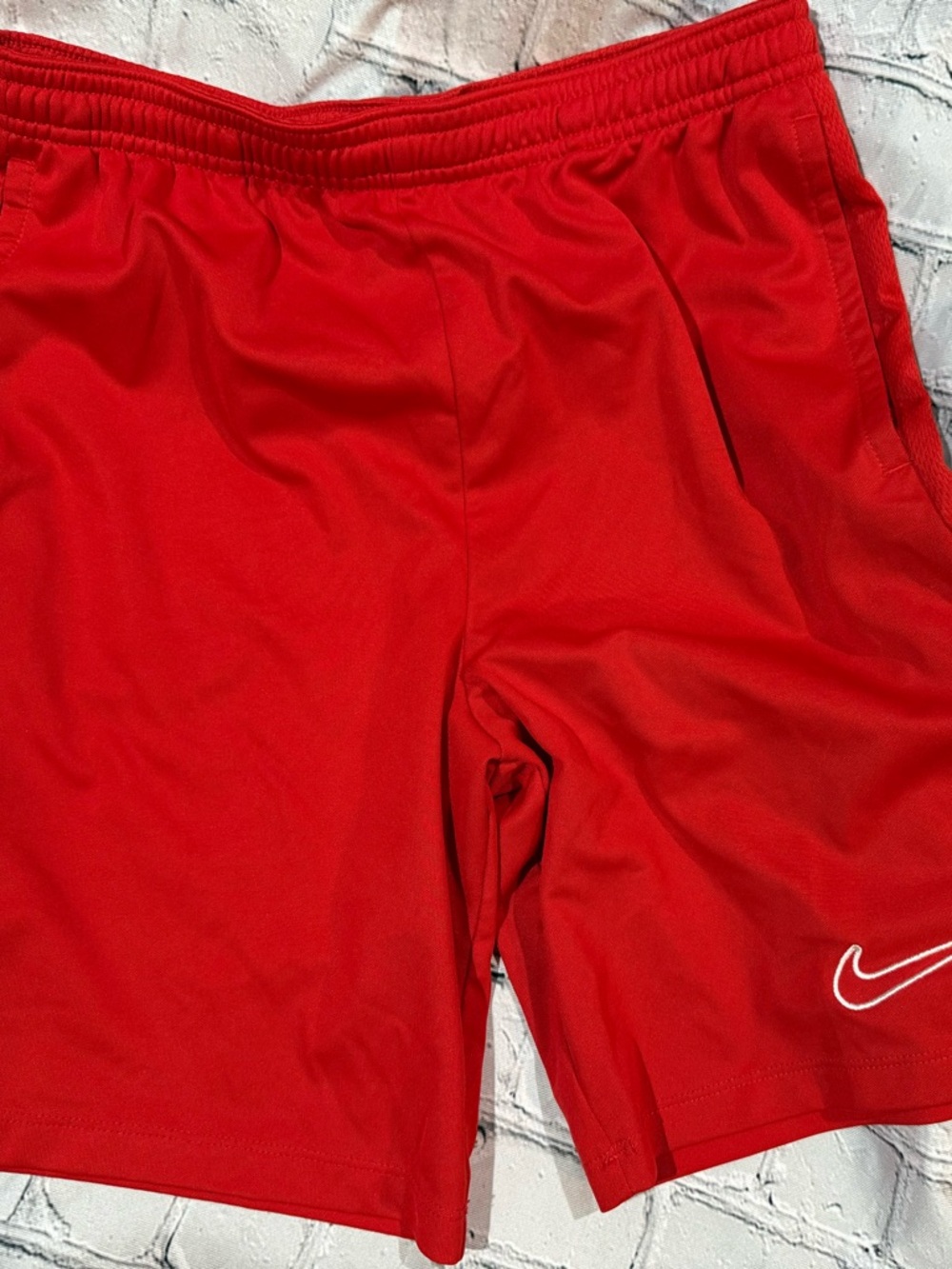 Nike Bright Red Athletic Shorts with White Swoosh